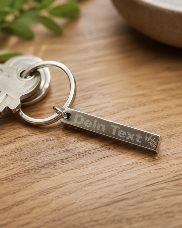 Personalisierter Schlüsselanhänger aus Metall mit Wunschtext und Motiv